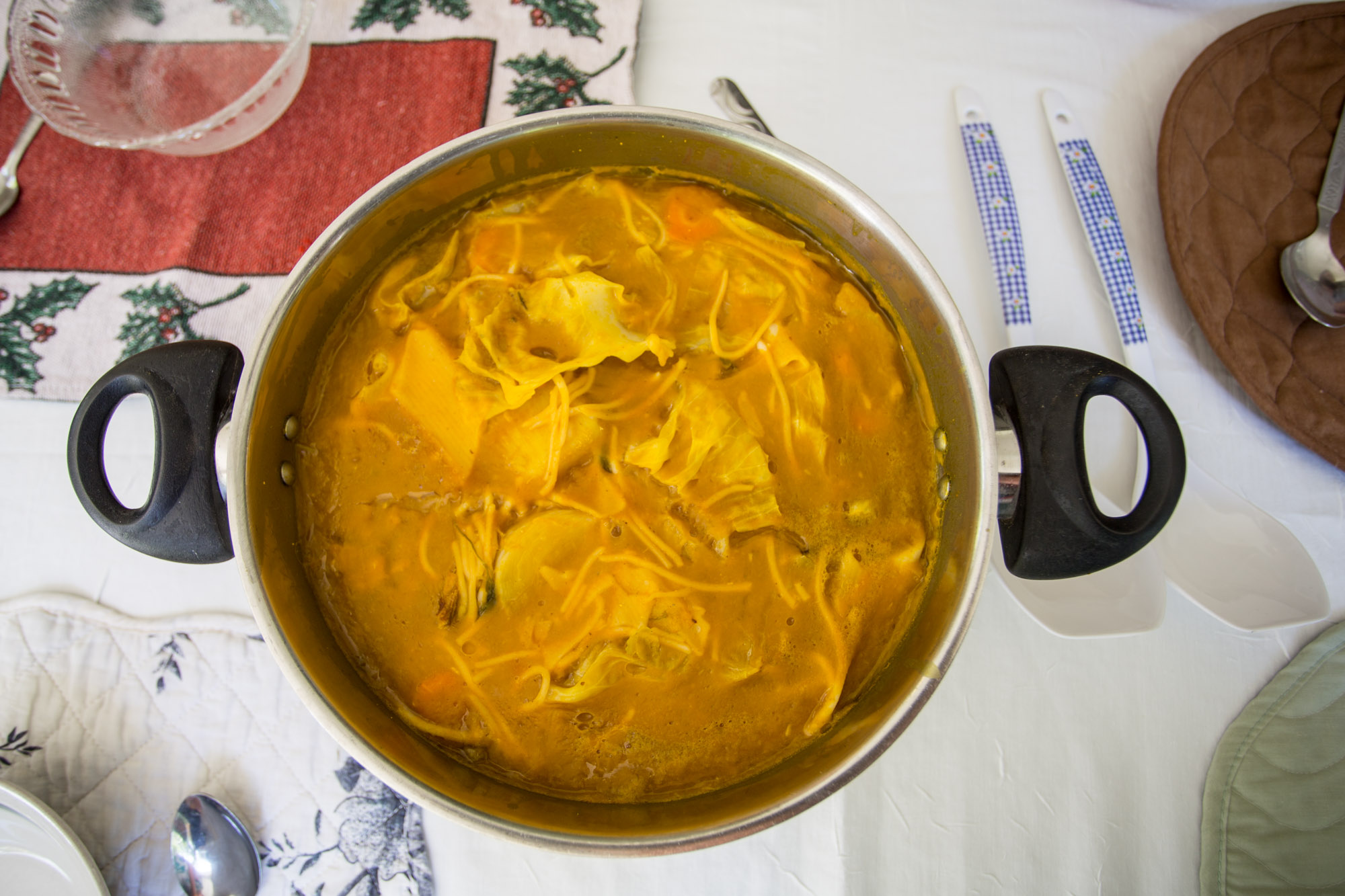 Haitian soupe joumou with squash, beef and vegetables